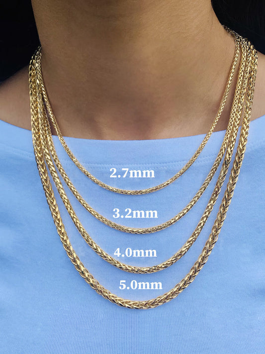 Solid 14K yellow gold rope chain necklace size comparison showing 2.7mm, 3.2mm, 4.0mm and 5.0mm widths worn together