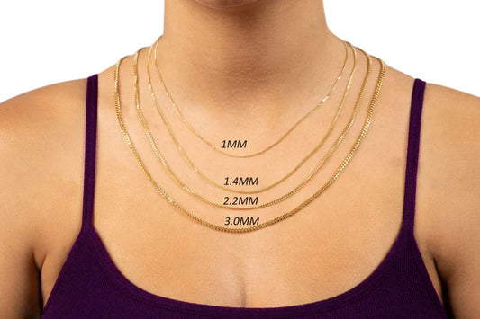 Solid 10K gold chain under $500 displayed in classic rope and Cuban styles from Certified Jewelry NYC